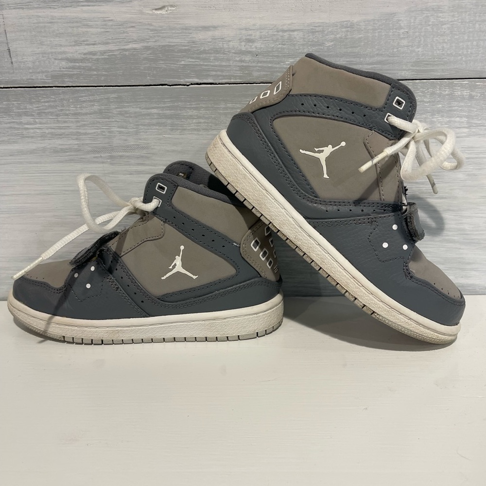 Little kids Nike Air Jordan’s size 12. Gray and white.